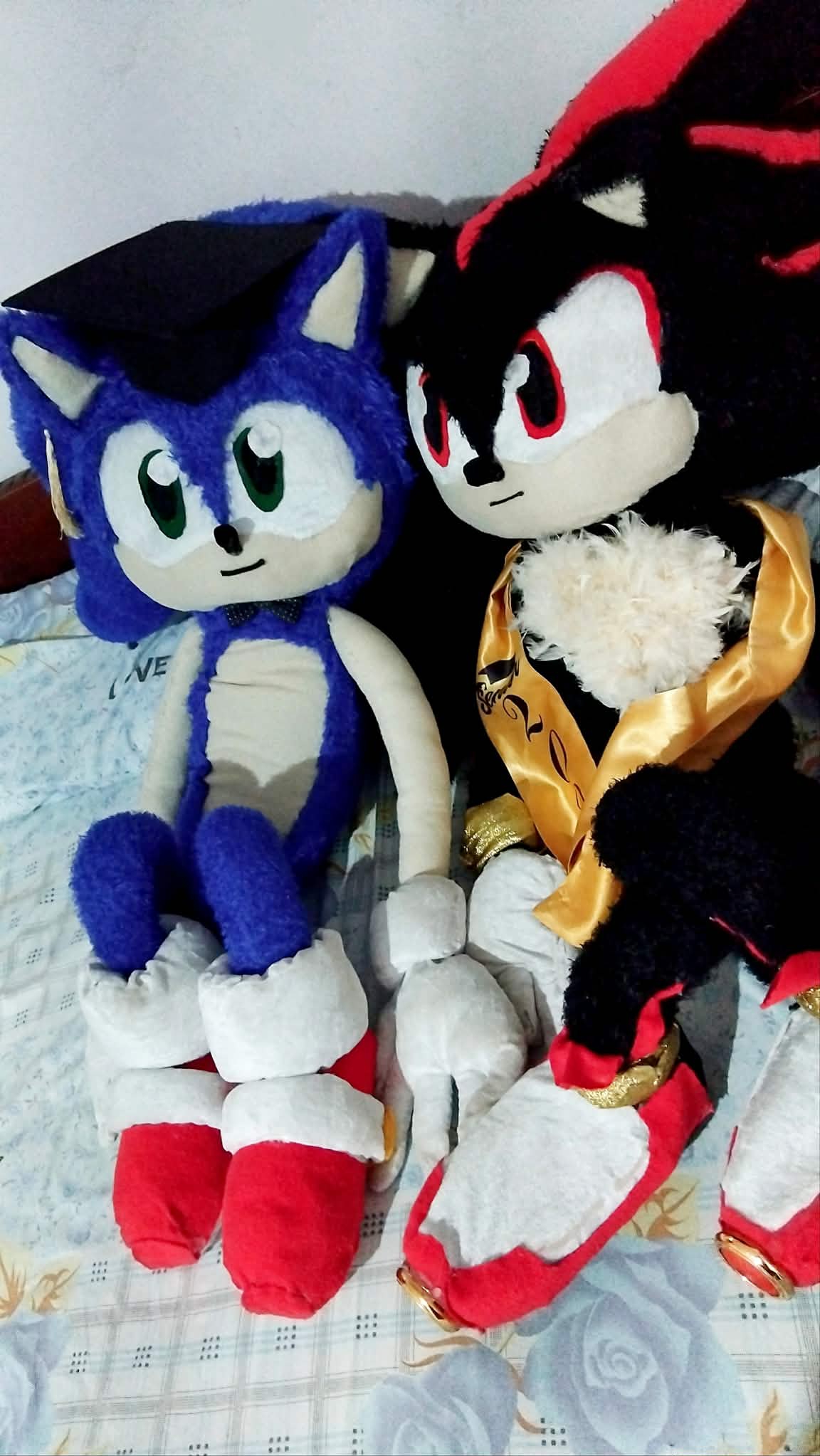 Handmade plush seated figure with coat